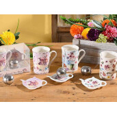 Set 3 cani portelan multicolor, 3 infuzoare otel ceai, 3 farfurioare in cutie cadou Ø 7,5 cm x 10,5 H, 300 ml